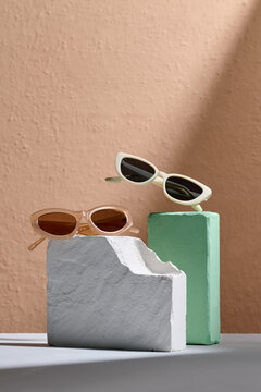 Trendy Sunglasses Displayed on Stylish Rough Cut Stones