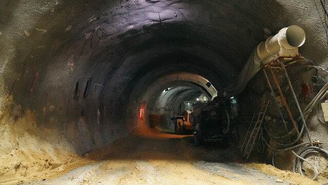 a bulldozer in excavated metro tunnel construction