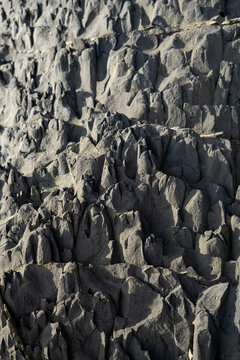 Detailed texture of rocky terrain showcasing rugged formations 