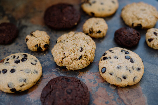 Top view of assorted cookies of varying flavors and sizes