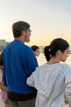 Family Observing the Marina View