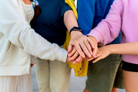 Family Hands Stacked in Unity