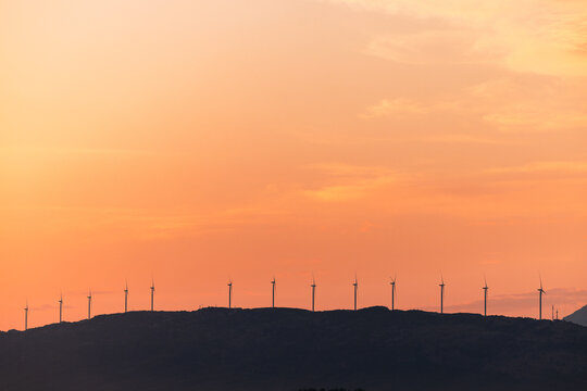 Windmills At Sunset