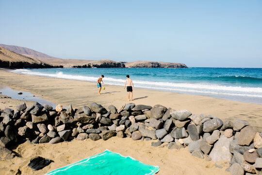 Brothers playing freestyle in the seascape of Papagayo Beach