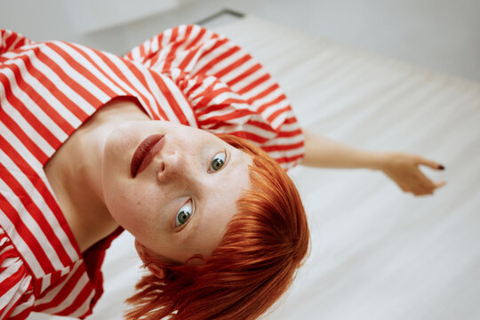 Low angle portrait of dancing woman