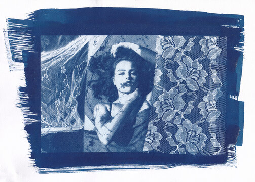  Woman lying down in a lace-inspired cyanotype