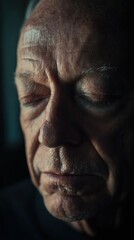 Introspective portrait of an elderly man contemplating in deep reflection