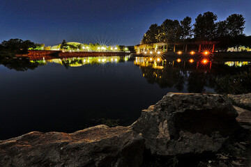 Mueller Lake Park - A large lake anchors this park featuring an amphitheater, loop trail and picnic...
