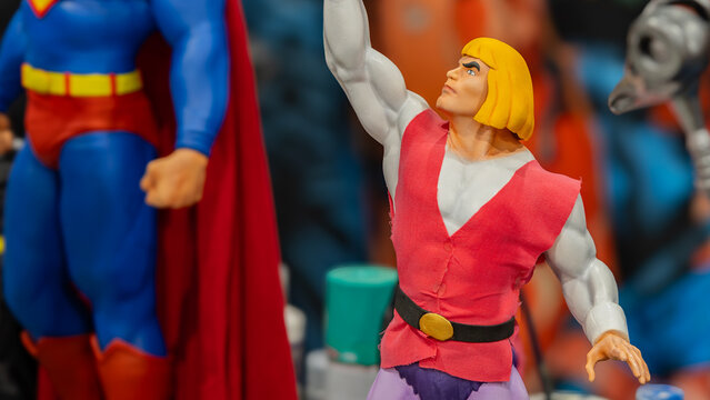 9th Comic Con Convention In GUAYAQUIL, ECUADOR - AUG 04, 2024 - Action figures of He-Man and Superman on display, representing iconic superhero and fantasy characters from pop culture.