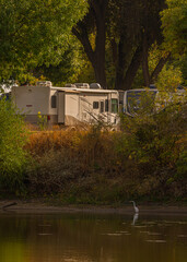 Rv motorhomes parked river side camping