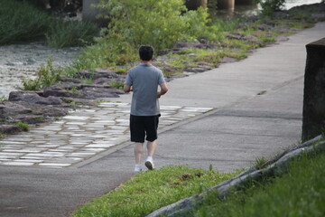Fototapeta premium Image of a person jogging on the Daecheongcheon Trail