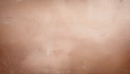 Fototapeta premium A close-up of a textured, pale peach wall with subtle imperfections.