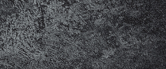 Fototapeta premium Close-up image of a textured, black and white surface. Classic, elegant and charming textured background photo for banner background.