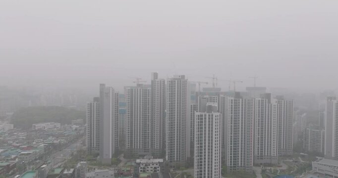 Aerial View of a Large Apartment Complex in Heavy Smog