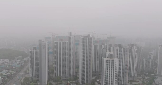 Aerial View of a Large Apartment Complex in Heavy Smog