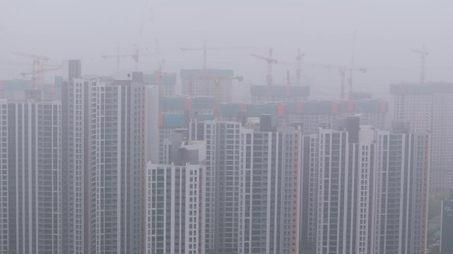Aerial View of a Large Apartment Complex in Heavy Smog