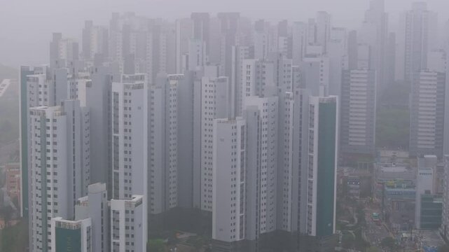 Aerial View of a Large Apartment Complex in Heavy Smog