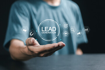 Lead generation concept, Business analysis, marketing strategy and finance. Man holding lead generation icons for analysis of financial business marketing strategies.