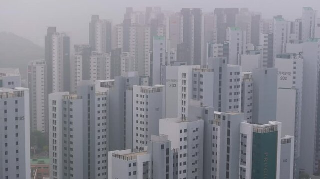 Aerial View of a Large Apartment Complex in Heavy Smog
