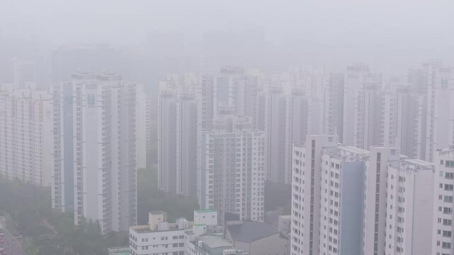 Aerial View of a Large Apartment Complex in Heavy Smog