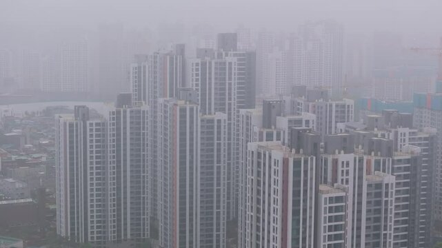 Aerial View of a Large Apartment Complex in Heavy Smog