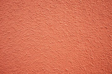 Fototapeta premium fine detailed red textured plaster wall surface