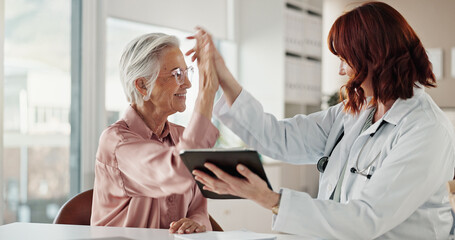 High five, patient and doctor with tablet, support and healthcare with treatment, cure and smile....