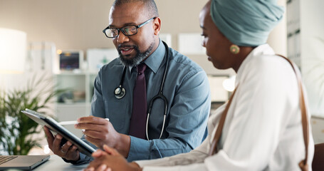Fototapeta premium Tablet, conversation and black woman with doctor in hospital for medical diagnosis or wellness advice. Discussion, digital technology and female patient with healthcare worker for checkup in clinic.