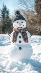Obraz premium Create a cozy winter background featuring a cheerful snowman with a scarf and hat, surrounded by soft, snowy scenery and plenty of copy space for seasonal messages. 