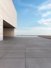 Fototapeta premium Modern architectural terrace overlooking a serene skyline under a bright blue sky