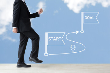 歩くビジネスマンとスタートからゴールまでの道のり