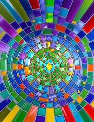 A Mosaic Background of Colorful Fractured Glass Pieces Creating a Kaleidoscopic Pattern