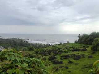 Wide angle of a spring landscape under a sky with clouds,gredos,spain.Scenic view of trees, a river and snowy mountains in autumn.a beautiful lake with moutains.