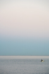 boat on the sea at sunset