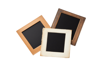 Three empty photo frames with various wooden designs on a white isolate background.