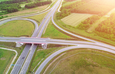 Countryside highway interchange in Europe under a blue sky