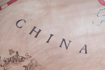 Close-up view of map showing China and its surrounding regions in vintage style