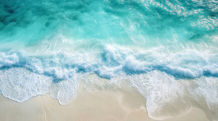 Obraz premium Aerial view of serene beach with turquoise waves gently lapping against white sandy shore, creating tranquil and inviting atmosphere