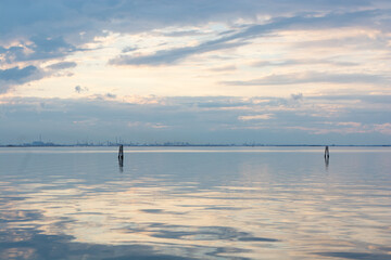 Venetian lagoon, at dusk, Sunset at Lido di Venezia. Venice area, Italy