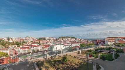 Fototapeta premium Panorama showing aerial view over the center of Lisbon timelapse from Miradouro de Sao Pedro de Alcantara