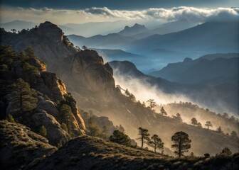 Obraz premium Majestic Mountainous Landscape Under Dramatic High Contrast Lighting in Pre-Desert Environment