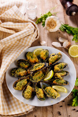 stuffed mussel with butter and parsley