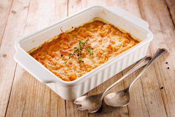 vegetable gratin on wooden background