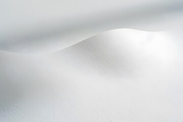 Obraz premium Close-up of plain white paper with smooth texture and minimalistic shadow effects