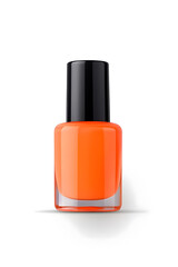 Obraz premium Coral pink nail polish bottle, isolated on white background