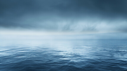 A blue sky with clouds and a horizon. The horizon is in the background