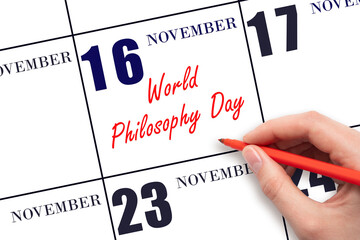 November 16. Hand writing text World Philosophy Day on calendar date. Save the date. Holiday. Important date. Day of the year concept.