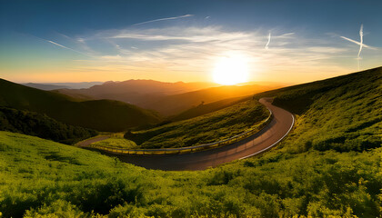 inding Road Through Lush Green Hills at Sunset