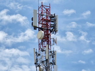 Telecommunication tower mast TV antennas wireless technology with blue sky