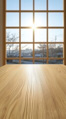 Fototapeta premium A wooden table with sunlight streaming through a window, creating a warm and inviting atmosphere.